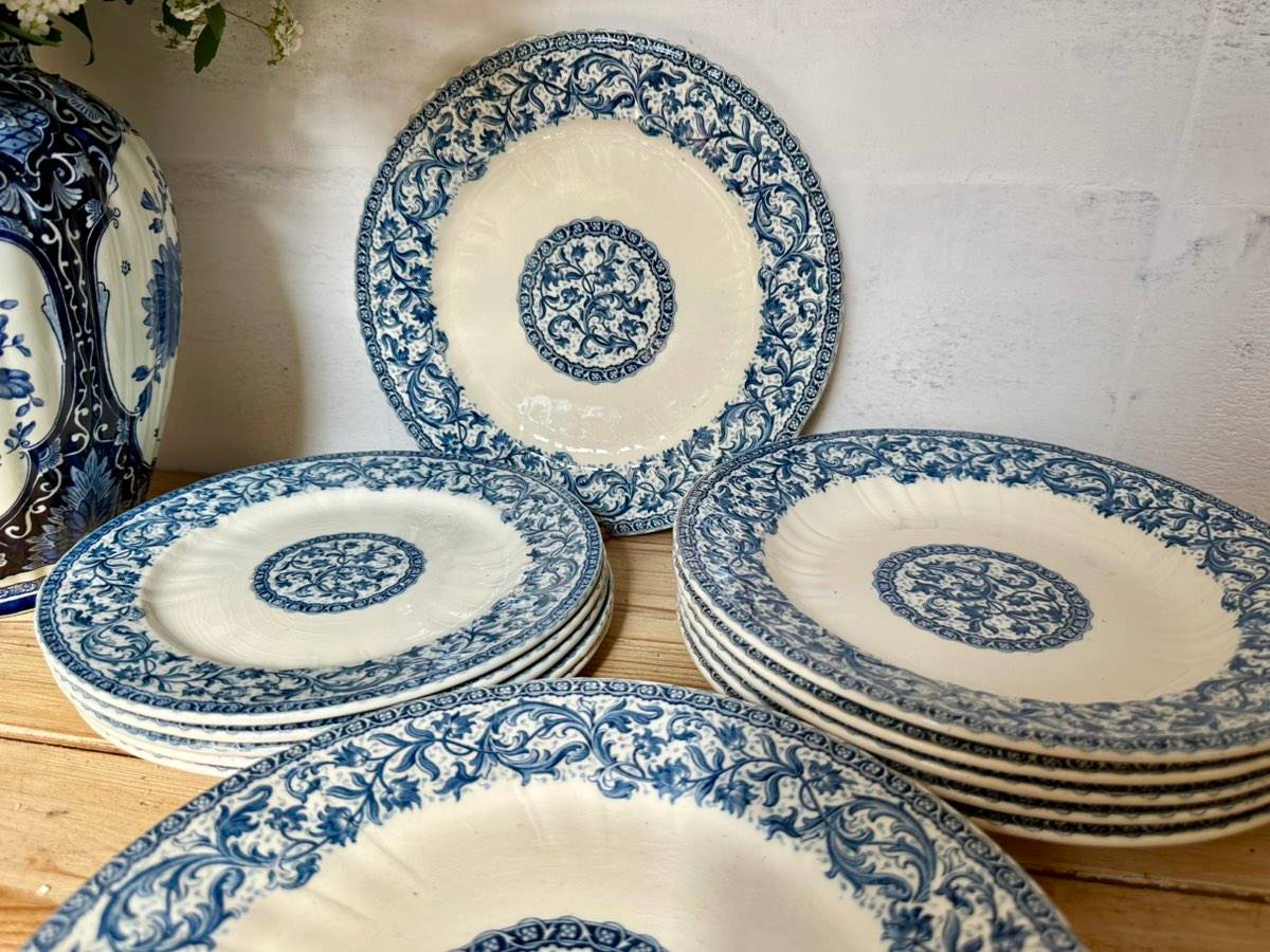 Antique Gien “Rouen” dinner plates, soup plates, and dessert plates.