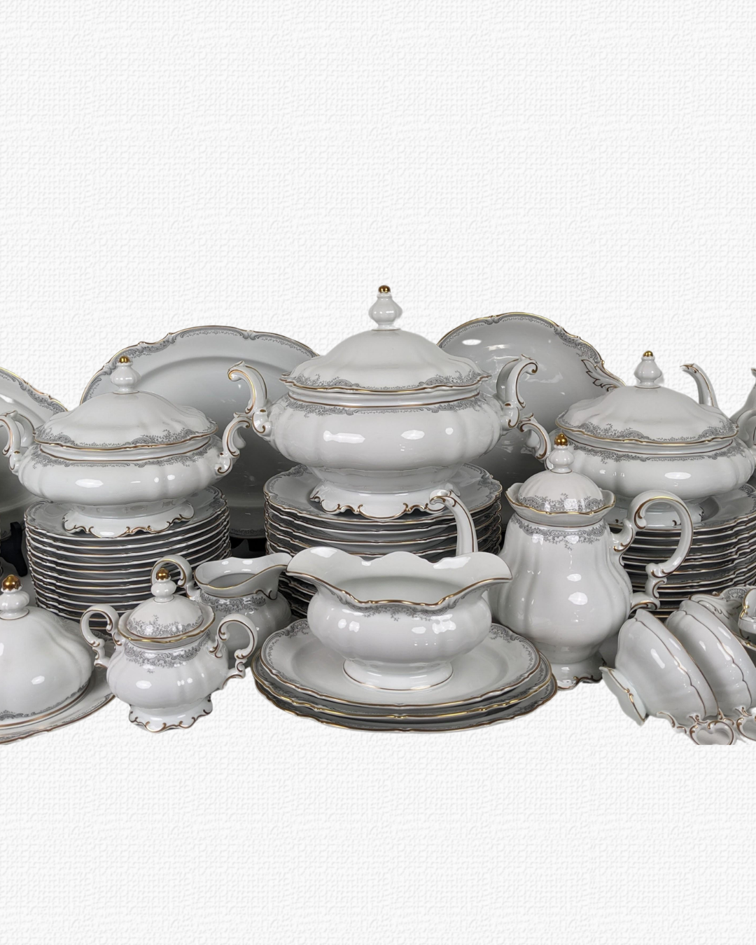 Hutschenreuther dinner set – Sylvia  gold rim.