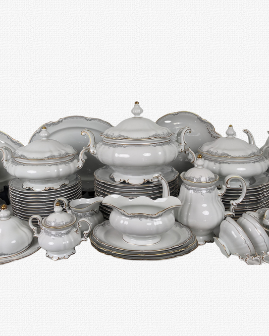 Hutschenreuther dinner set – Sylvia  gold rim.