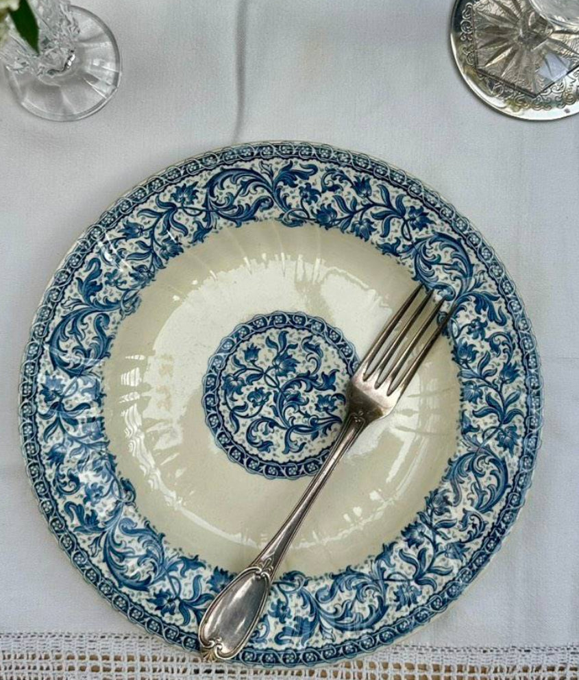 Antique Gien “Rouen” dinner plates, soup plates, and dessert plates.